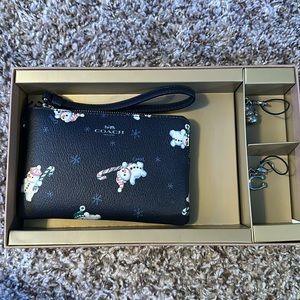 Coach Wristlet with Charms